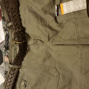 Brand new olive colored shorts with belt